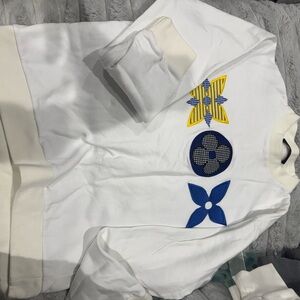 White Sweatshirt with Blue and Yellow Graphic